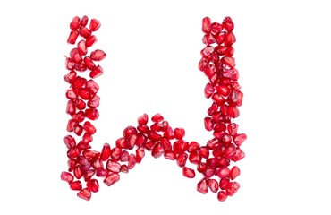 W English Alphabet Capital Letter Written with Pomegranate Seeds Isolated on White Background, Kindergarten Children Education Concepts