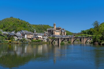 view of the picturesque French village of Estaing on the Lot River in south central France