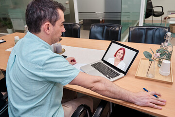 businessman in a business meeting via video call. doctor attending to her patient via conference...