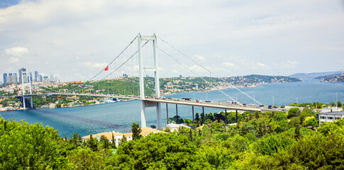 Bosphorus suspension bridge over the sea in the Istanbul city