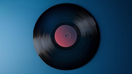 A vintage vinyl record lying on a gradient background from deep indigo to midnight blue, suggesting nostalgia and the depth of music history.