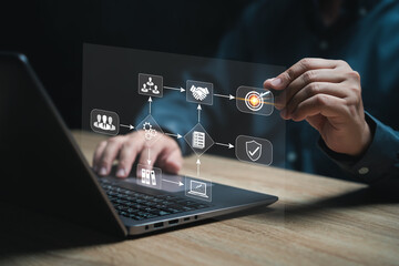 Business management workflow concept, Businessman use laptop making workflow chart, Company...