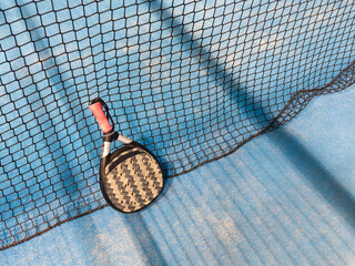 Paddle objects on blue turf