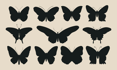 Set of silhouettes of butterflies of different shapes. 