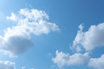Blue Sky with Fluffy Clouds on a Sunny Day