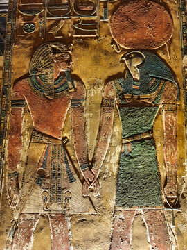 Painted wall relief in Burial chamber J showing Pharoah Seti I before God Ra Horakhty on a pillar in the Tomb of Seti I, KV17 at the Theban necropolis in the Valley of Kings in Luxor,Egypt