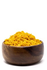 Closeup of Sev Indian Snack in a Wooden Bowl Isolated on White Background with Copy Space