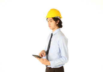 Portrait of young engineer ordering with tablet over white background