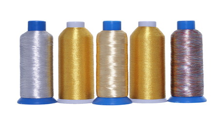 Thread spools for textile factory. Thread for seamstress in clothing production.