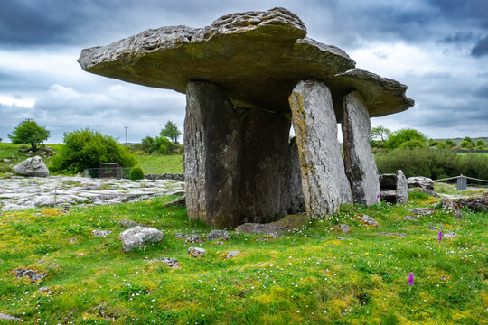 Poulnabrone dolmen in Burren geopark, Ireland, with dramatic cloud sky