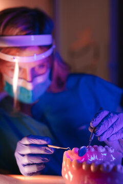 A dental technician working 