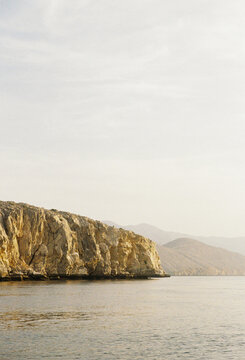 Mountains of Oman during the sunset with the sea