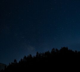 Fototapeta premium Milky way Galaxy over Mountain in Himalayas, Manali, Kullu, Himachal Pradesh, India