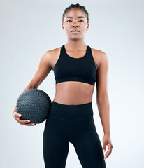 Portrait, black woman and confident with slam ball in studio on white background for fitness or...