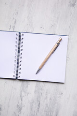 Little white Notepad for checklist and pencil