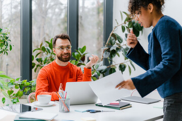 A man and a woman in the office