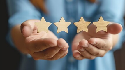 A hand holding yellow stars, The best excellent business services rating customer experience concept