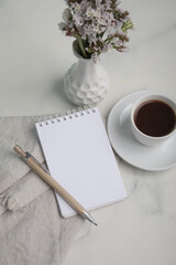 Little white Coffee cup and notepad morning planning