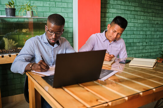 Latin men working remotely