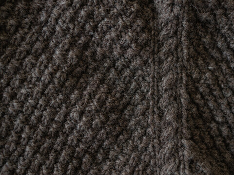 Close up of sweater being knit from handspun yarn