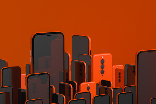 Assortment of smartphones on orange background