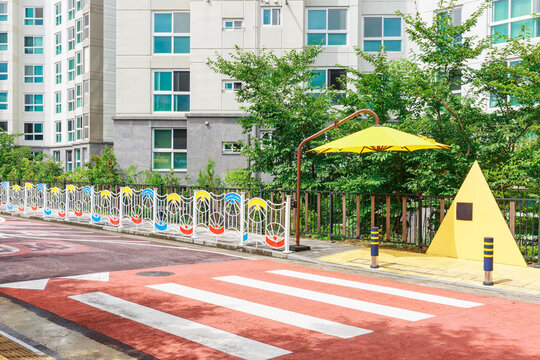 Yellow parasol installed on the crosswalk.