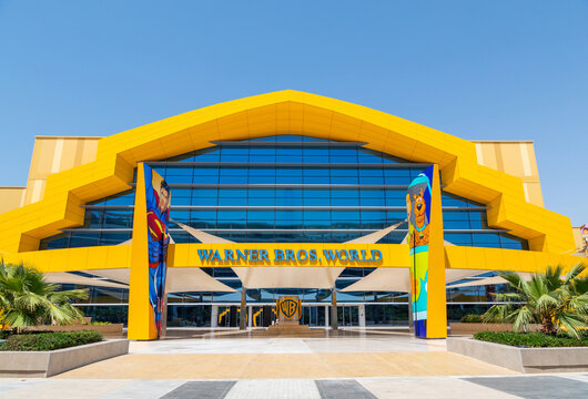 Abu Dhabi, UAE - April 24, 2024: The wide-angle view of Warner Bros World entrance in Abu Dhabi captures its colorful facade, including Superman and Scooby-Doo graphics