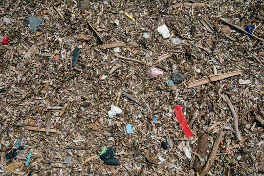 Microplastics scattered at the beach