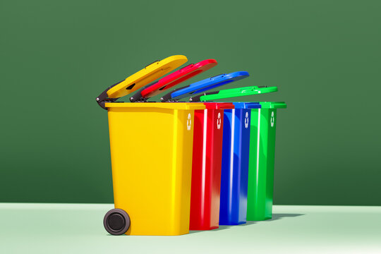 Color-coded recycling bins. Waste disposal concept.