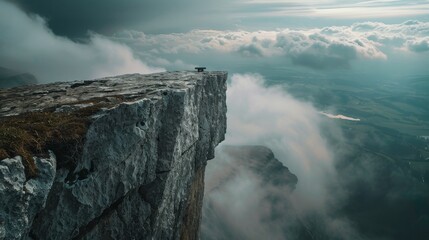 Dramatic mountain landscape with fog and sunrise for inspiration or adventure themed designs