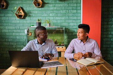 Colleagues talking about work