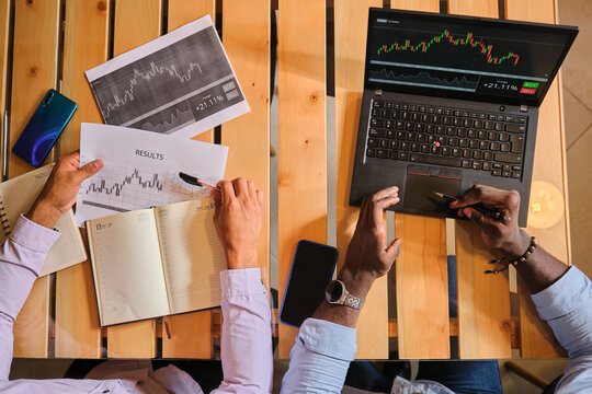 Two people working in the global financial market