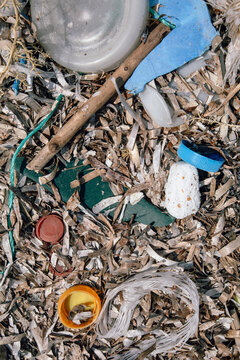 Plastic bottle caps on the beach