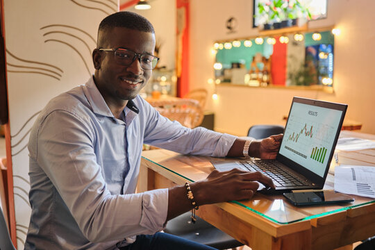 Smiling Latino man in the office