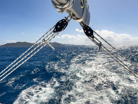 landscape with sail mast on ocean 