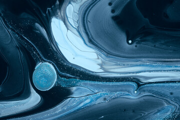 Blue ink abstract background with