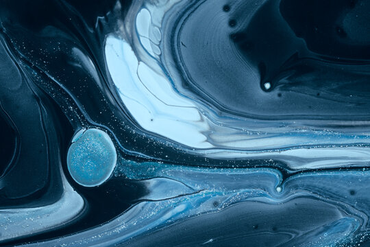 Blue ink abstract background with