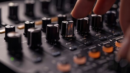 A close-up shot of an equalizer's knobs and sliders being adjusted, with the user's hand visible in the frame.