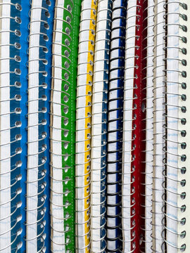 Stack of Spiral wire Notebooks background
