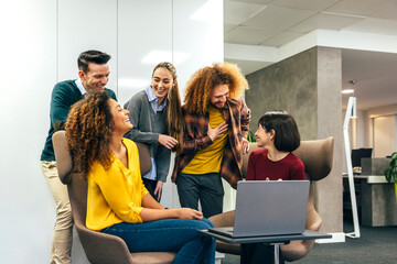 Collaborative team having a casual meeting in office space