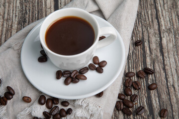 Little white Cup of black expresso coffee