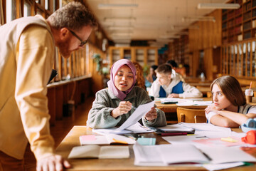 Professor helping students