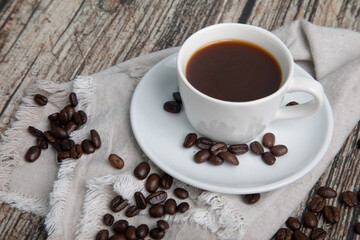 Little white Cup of black expresso coffee