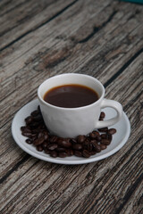 Little white Cup of black expresso coffee