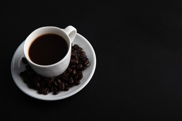 Little white Cup of black expresso coffee