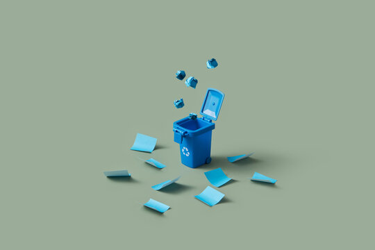Trash can with lid and recycling sign standing among scattered sheets