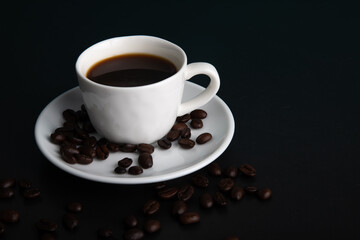 Little white Cup of black expresso coffee