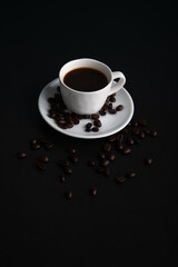 Little white Cup of black expresso coffee