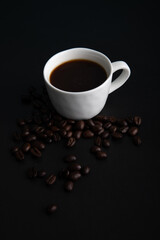 Little white Cup of black expresso coffee