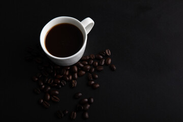 Little white Cup of black expresso coffee